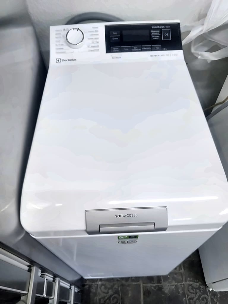 Стиральная машина Electrolux PerfectCare 700 — фото реального экземпляра